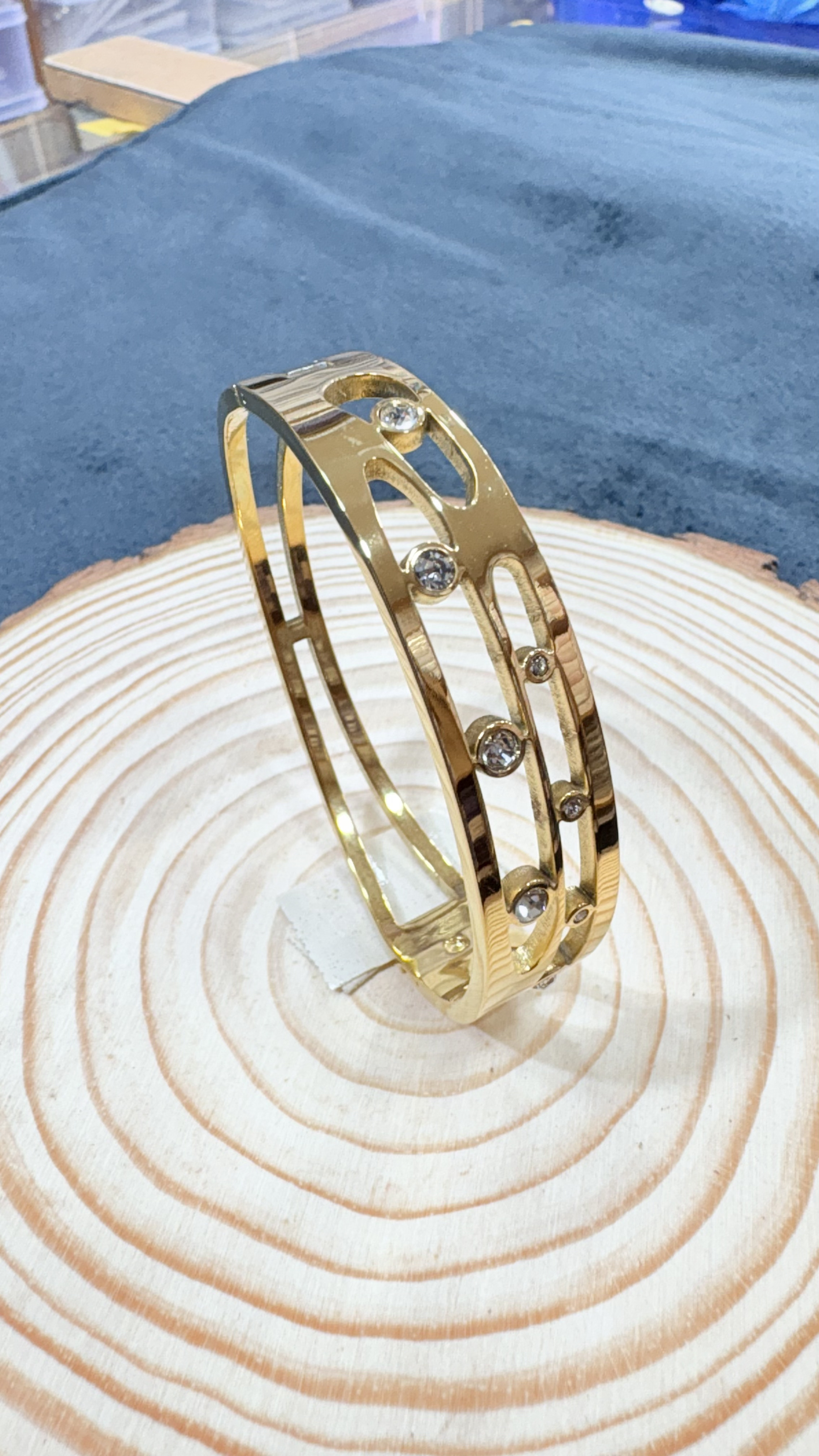 Elegant Gold Plated Bangle with Embedded Crystals